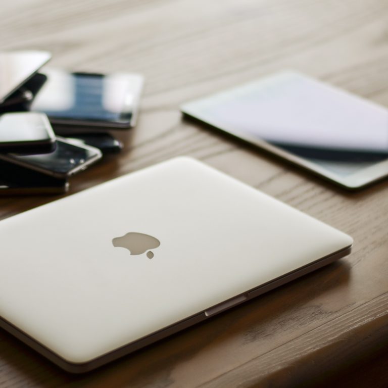 Multiple devices lying on a desk