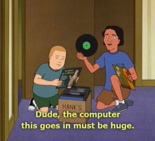 Two teens looking through a box of old records