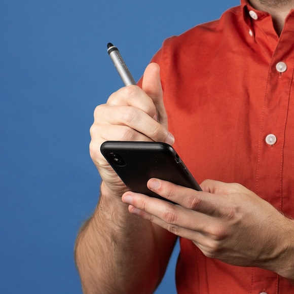 Man using a stylus on a PDA