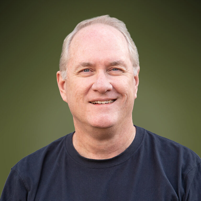 Developer Davd Faltermier smiling in a blue shirt.