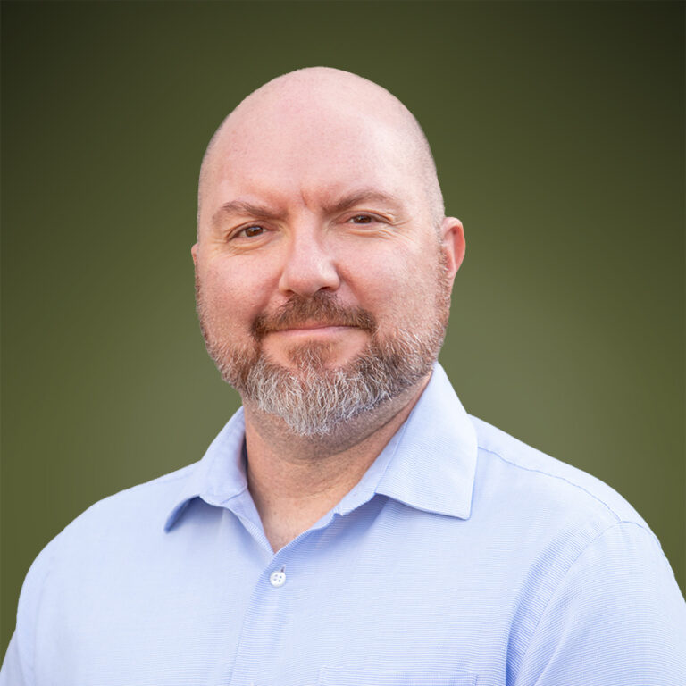 Developer Jamie Katz in a blue collared shirt.